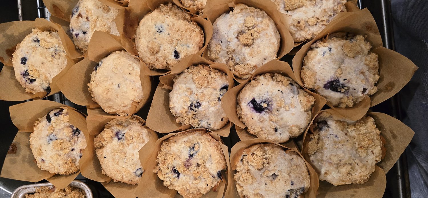 Blueberry streusel muffins in tulip papers